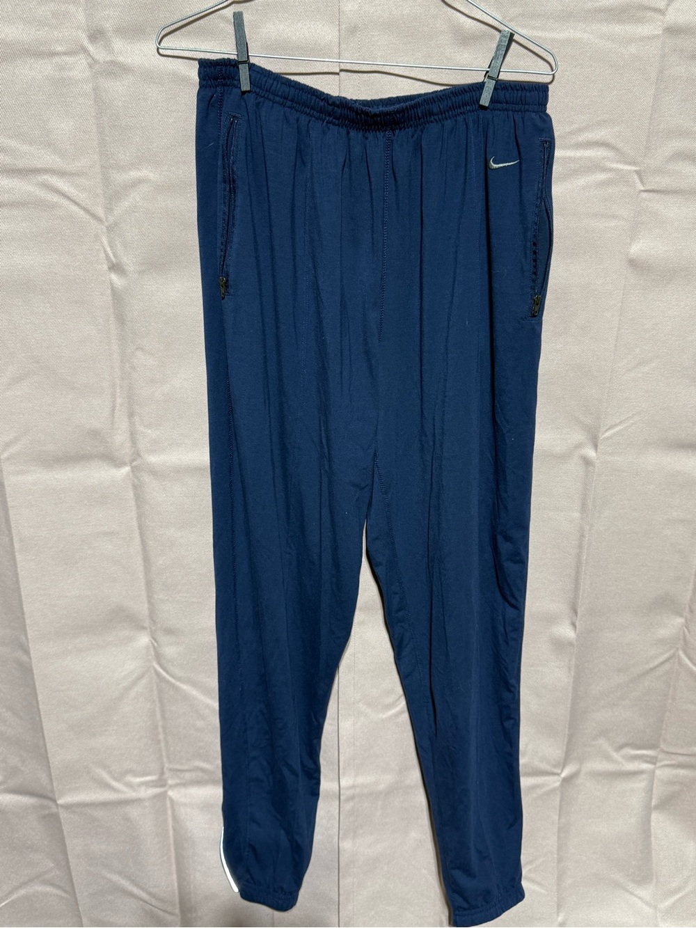 Nike Men's Dark Blue Athletic Joggers with Zip Pockets